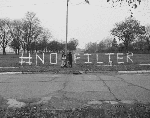 #NoFilter A Message in Nestle Water Bottles from Shea Cobb, Amber Hasan, Macana Roxie and LaToya Ruby Frazier at Sussex Drive and West Pierson Road, Flint MI, 2017